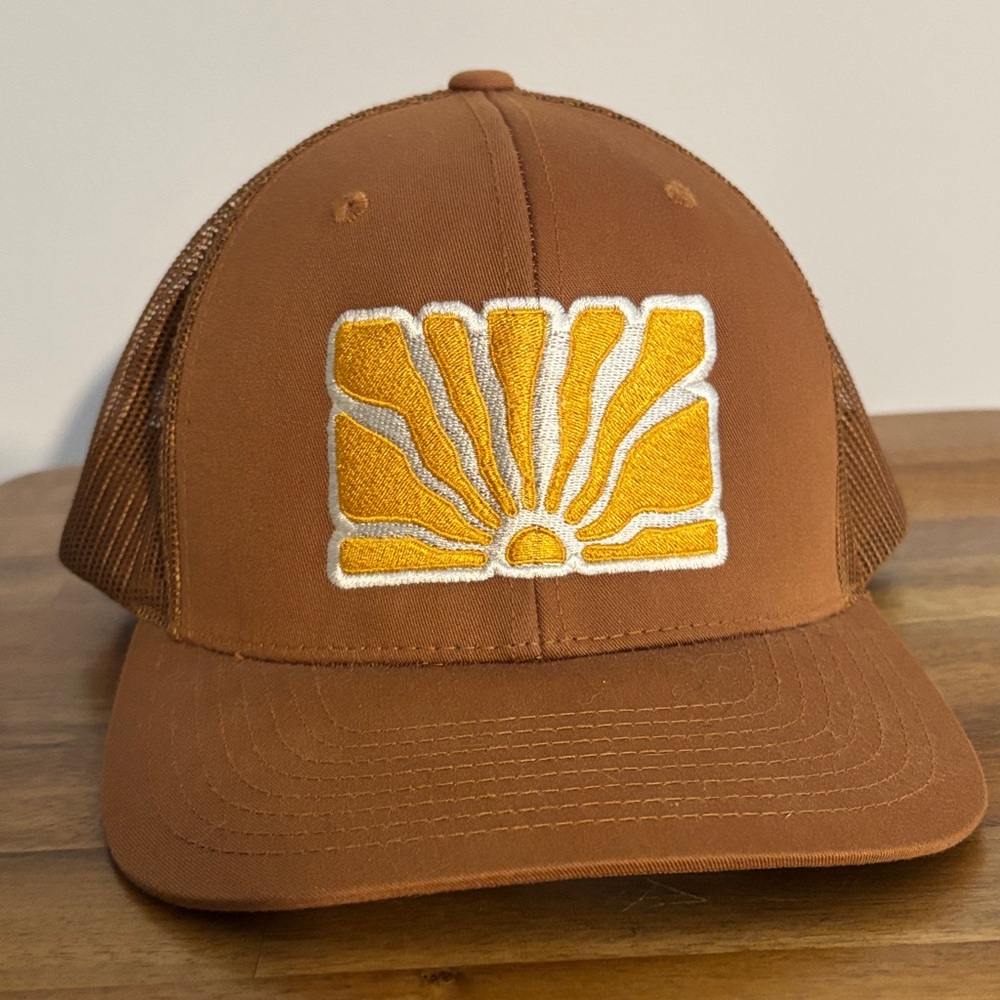 Brown Trucker Hat with Yellow Sunburst Patch